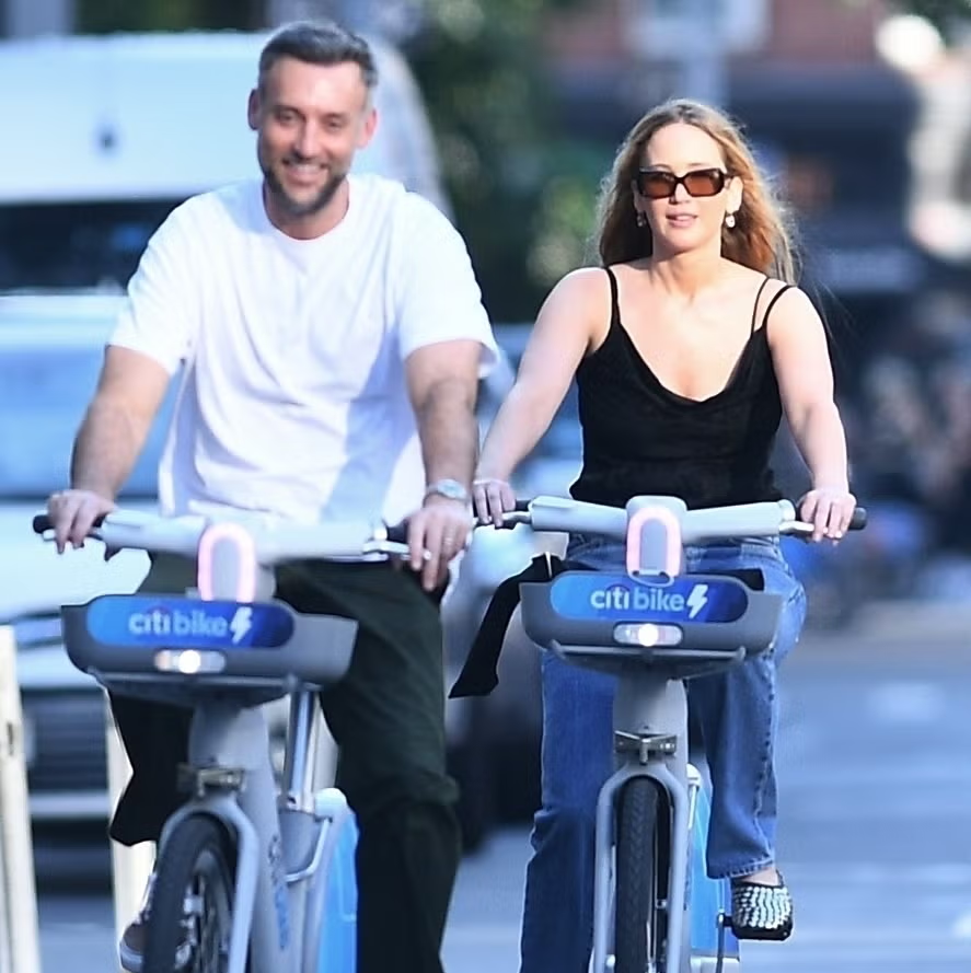 Cooke and Jennifer Riding Bike